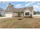 Beautiful single-Gathering home featuring a two-car garage, neutral siding, and well-maintained landscaping at 125 Prosecco Dr, Princeton, NC 27569