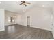 Open-concept living room and dining area with lots of natural light and neutral paint at 125 Prosecco Dr, Princeton, NC 27569