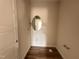Bathroom with a mirror, vanity, and fixtures ready for finishing at 125 Tuskeegee Dr, Smithfield, NC 27577