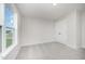 Bedroom with a large window for natural light and a closet at 125 Tuskeegee Dr, Smithfield, NC 27577