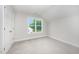 Comfortable bedroom with a window, a closet, and neutral carpet at 125 Tuskeegee Dr, Smithfield, NC 27577