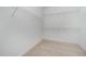 Walk-in closet with wire shelving and carpet at 125 Tuskeegee Dr, Smithfield, NC 27577