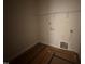 New laundry room featuring premium waterproof flooring and utility connections at 125 Tuskeegee Dr, Smithfield, NC 27577