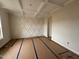 Bright living room featuring decorative wall trim, coffered ceiling and natural light at 125 Tuskeegee Dr, Smithfield, NC 27577