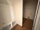 Bright mudroom with premium waterproof flooring, bench seating and shelving at 125 Tuskeegee Dr, Smithfield, NC 27577