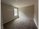Comfortable bedroom with plush carpet and ample natural light, ideal for a peaceful retreat at 131 Wilderness Trl, Smithfield, NC 27577
