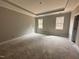 Bedroom featuring a tray ceiling, natural light, and neutral paint, ready for personalization at 139 Red River Dr, Selma, NC 27576