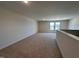 Bright bonus room with carpet floors and lots of natural light at 141 Trescott St, Smithfield, NC 27577