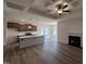 Stylish kitchen boasts a breakfast bar, modern stainless steel appliances, and an open layout perfect for entertaining guests at 141 Trescott St, Smithfield, NC 27577