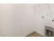 A bright and clean laundry room with a wire rack at 141 Trescott St, Smithfield, NC 27577