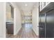 Open entryway with hardwood floors leading to a spacious living area at 143 Royal Ave, Selma, NC 27576