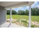 A backyard view from a covered back porch at 147 Tuskeegee Dr, Smithfield, NC 27577