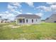 Backyard view with partially seeded lawn at 147 Tuskeegee Dr, Smithfield, NC 27577