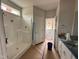 Bathroom with a white shower, a toilet, and vanity with sink at 147 Tuskeegee Dr, Smithfield, NC 27577