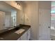 Bathroom featuring a shower and sink with modern fixtures at 147 Tuskeegee Dr, Smithfield, NC 27577