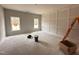 Bright bedroom featuring light-colored walls, and large windows at 147 Tuskeegee Dr, Smithfield, NC 27577