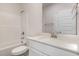 Well-lit bathroom includes a tub and shower combination and updated vanity at 15 Lupin Dr, Smithfield, NC 27577