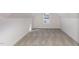 Spacious bedroom with carpet flooring and ample natural light from a window at 15 Lupin Dr, Smithfield, NC 27577