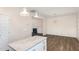 Bright kitchen showcasing stainless steel appliances, granite countertops, pendant lighting, and ample cabinet space at 15 Lupin Dr, Smithfield, NC 27577