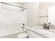 Bathroom with white shower and granite countertop sink at 163 Royal Ave, Selma, NC 27576