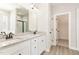 Bathroom showcases double sink vanity with granite countertop and walk-in shower at 163 Royal Ave, Selma, NC 27576