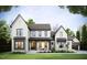 Inviting two-story home with brick and siding, featuring a cozy front porch and attached garage for modern living at 1644 Legacy Ridge Ln, Wake Forest, NC 27587