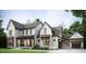 Charming two-story home boasts a brick and siding facade, complemented by a manicured lawn and inviting front porch at 1644 Legacy Ridge Ln, Wake Forest, NC 27587