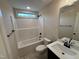 A full bathroom with shower-tub, vanity and countertop space at 18 Bonnybrook Ct, Selma, NC 27576