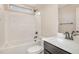 Bathroom featuring a shower-tub combo, single sink vanity, and neutral walls at 18 Bonnybrook Ct, Selma, NC 27576