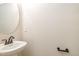 Bathroom with a pedestal sink and oil-rubbed bronze fixtures at 18 Bonnybrook Ct, Selma, NC 27576