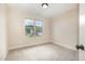 Bedroom featuring neutral walls and carpet and a window view at 18 Bonnybrook Ct, Selma, NC 27576