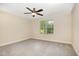 Bedroom featuring neutral walls and carpet and a window view at 18 Bonnybrook Ct, Selma, NC 27576