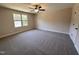 Bedroom featuring a ceiling fan, carpet, and a window at 18 Bonnybrook Ct, Selma, NC 27576