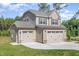Charming two-story home with a large driveway and three car garage at 18 Bonnybrook Ct, Selma, NC 27576