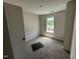 Cozy bedroom with carpet flooring, bright window, and neutral walls at 18 W Emily Gardens Dr, Selma, NC 27576