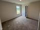Comfortable bedroom with plush carpeting, window, and neutral walls at 18 W Emily Gardens Dr, Selma, NC 27576