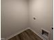 Utility room featuring connections for laundry appliances and storage cubby at 18 W Emily Gardens Dr, Selma, NC 27576