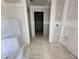 Unfinished bathroom featuring a new tub and plumbing at 18 W Emily Gardens Dr, Selma, NC 27577