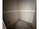 A bathroom under construction with gray walls, white trim, and fixtures for a sink and toilet at 18 W Emily Gardens Dr, Selma, NC 27577