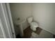 A bathroom features a pedestal sink and standard toilet at 18 W Emily Gardens Dr, Selma, NC 27577