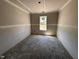 Bedroom featuring natural light and smooth walls ready to be painted at 18 W Emily Gardens Dr, Selma, NC 27577