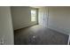 Cozy bedroom with a window, a closet, plush carpet, and neutral paint at 18 W Emily Gardens Dr, Selma, NC 27576