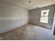 Bright bedroom with window providing nice view of the outdoors at 18 W Emily Gardens Dr, Selma, NC 27577