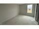 Empty bedroom with a window at 18 W Emily Gardens Dr, Selma, NC 27577