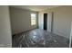 A clean bedroom with closet, window and neutral walls offers a blank canvas for new homeowners at 18 W Emily Gardens Dr, Selma, NC 27577
