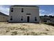 Exterior back of home with multiple windows allowing for lots of natural light at 18 W Emily Gardens Dr, Selma, NC 27577