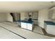 Bright kitchen featuring granite countertops, modern appliances, an island with a sink, and an open layout at 18 W Emily Gardens Dr, Selma, NC 27577