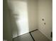 The laundry room features fresh paint and trim at 18 W Emily Gardens Dr, Selma, NC 27577