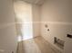 A laundry room under construction with gray walls and white trim at 18 W Emily Gardens Dr, Selma, NC 27577