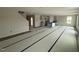 Open-concept living room and kitchen area featuring modern finishes and ample space at 18 W Emily Gardens Dr, Selma, NC 27577
